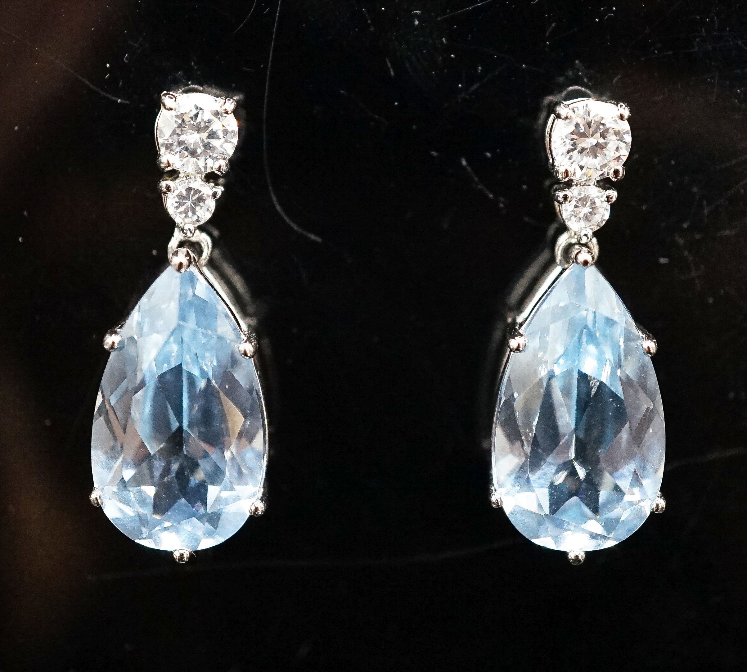 A pair of white metal and two colour cubic zirconia set pear shaped drop earrings, 30mm.